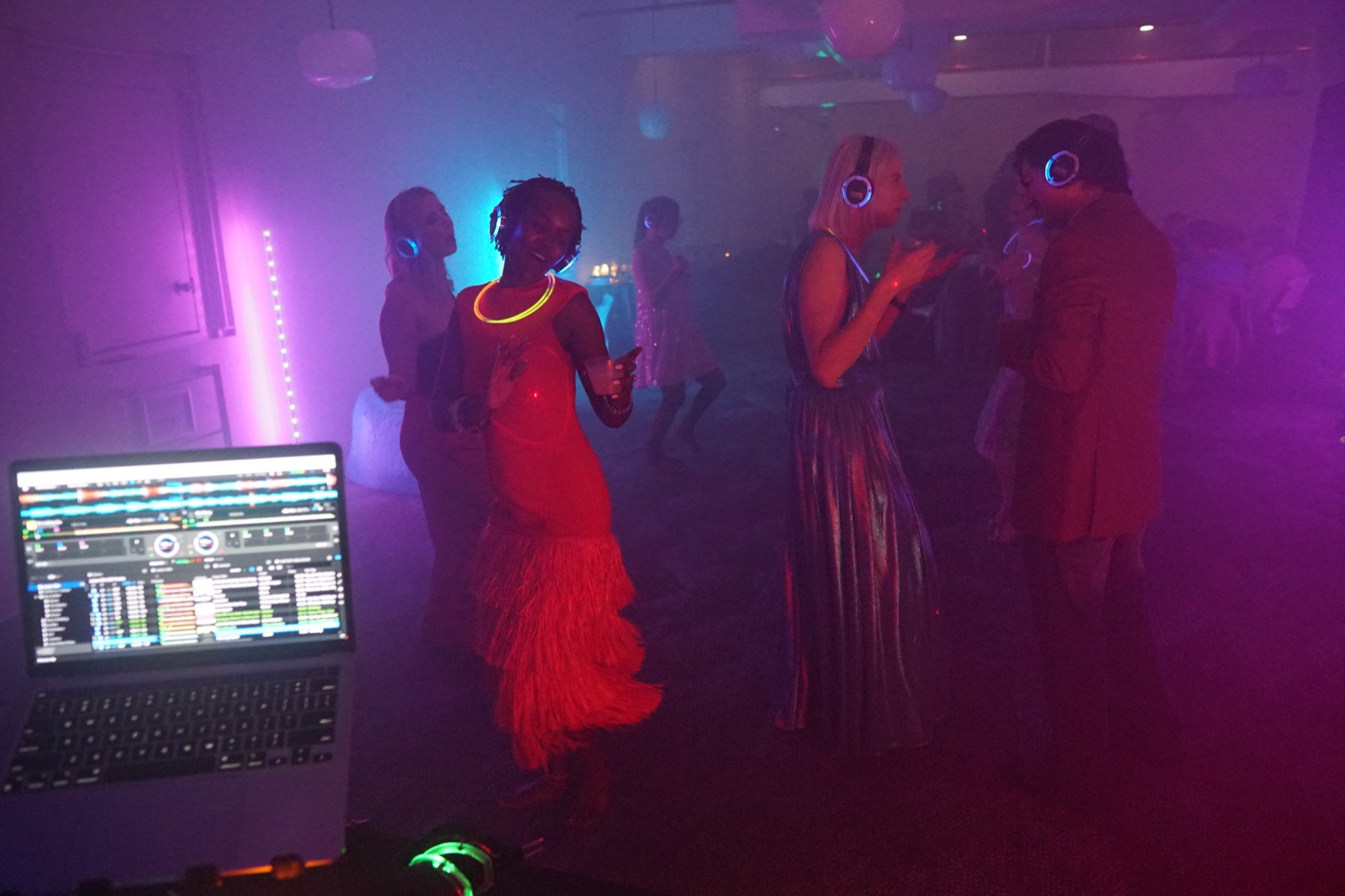 Late-night silent disco with production lighting