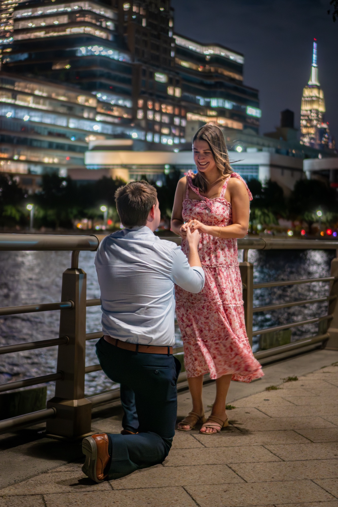 NYC proposal photographer with Empire State Building view