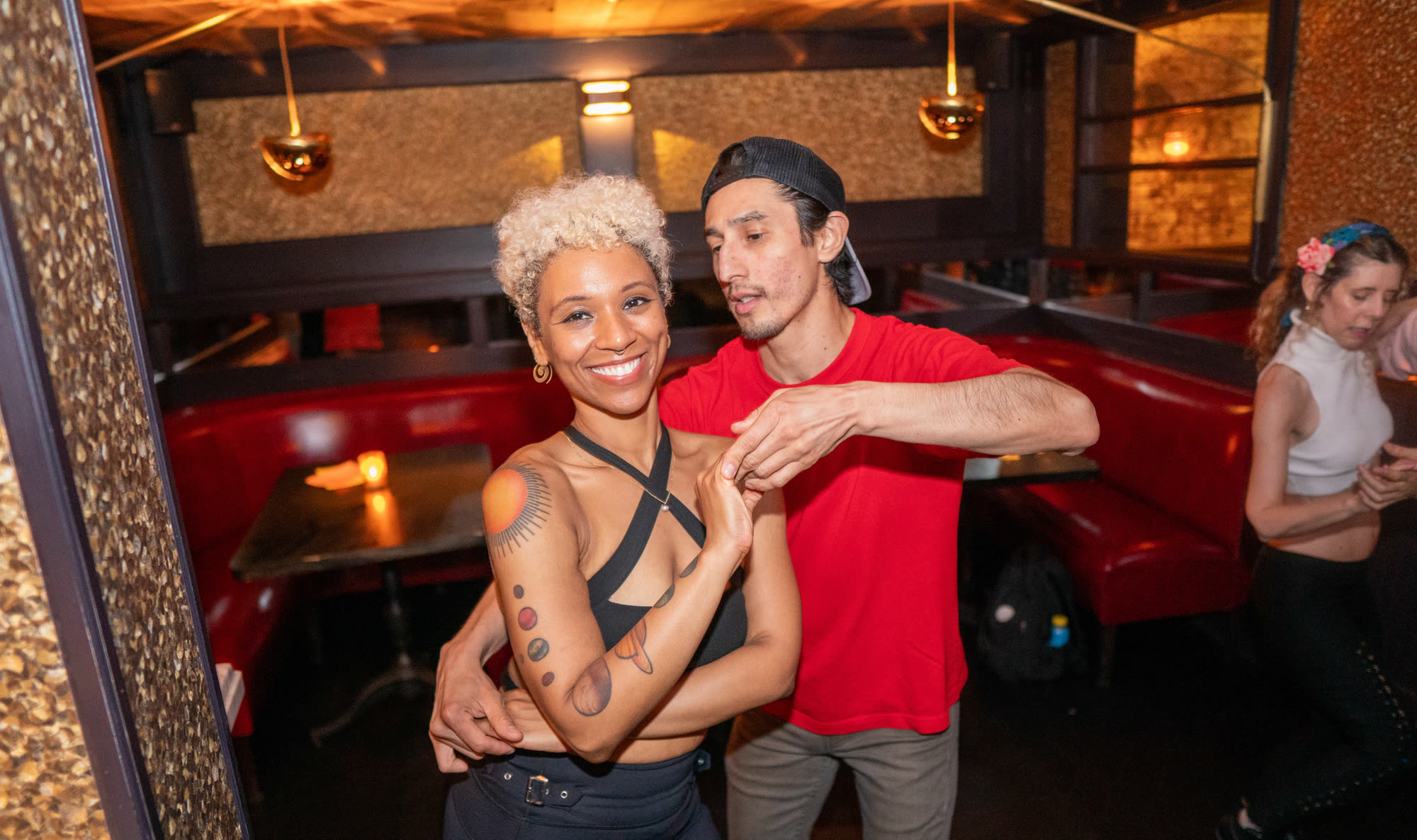 Salsa couple in closed position mid-song